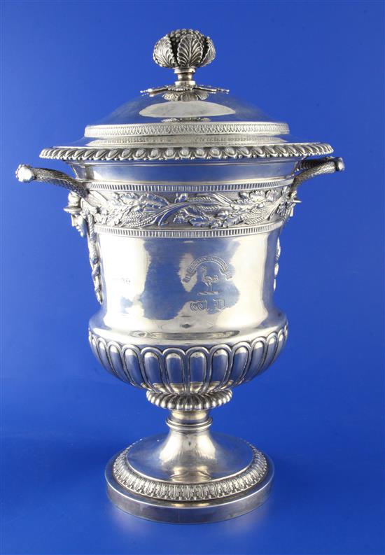 A George III silver two handled presentation cup and cover by Story & Elliot, Gross 57 oz.